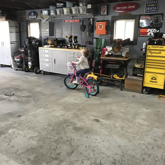Organized garage with tool cabinets and storage bins - Hairball from Webster, NY