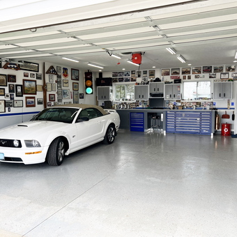 Organized garage with tool cabinets and Mustang - Gary from Divernon, IL