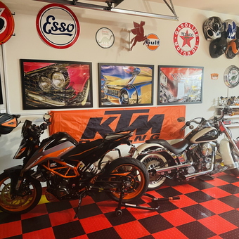 Garage with Motorcycles, Retro Signs, and Helmets - Mahaff from Houston, TX