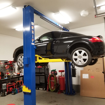 Home garage with car lift, workbench, and tool chests - Terry from Wappingers Falls, NY