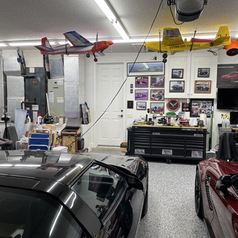 Organized garage with tool chest, model planes, and Corvettes - Bob from Hobe Sound, NJ