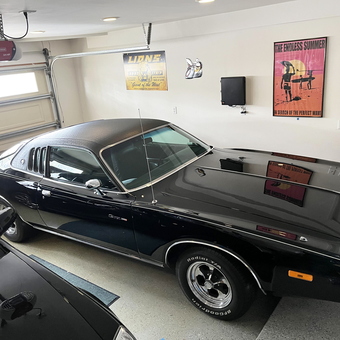 Classic Car Garage with Posters and Storage - Bryan