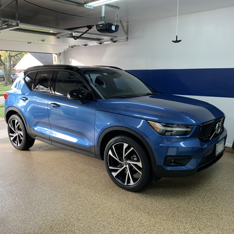 Modern epoxy garage floor and blue SUV - Keith from La Porte, TX