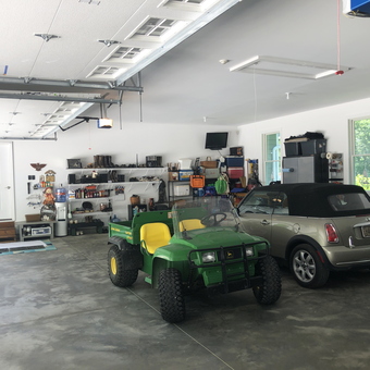 Organized Garage with Shelves, Cabinets, Vehicles - Butch from St. Clair, MO