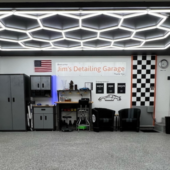 Modern garage with cabinets, wall art, LED lights - Jim's Detailing from Shorewood, IL