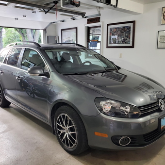 Modern Garage With Framed Car Art and Volkswagen ci-27727