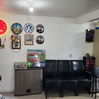 Garage Wall with VW Decor, Neon Clock, and Seating - ci-27728