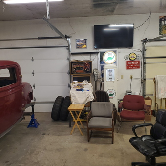 Classic Car Garage With Wall Signs and Seating - Shunk from Milford, IL