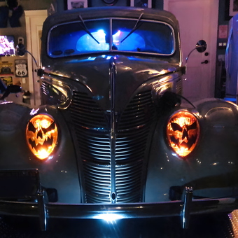 Classic Car with Halloween Headlights in Garage - Gerry