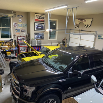 Organized garage with tool storage and car wall art - John from Glasgow, KY