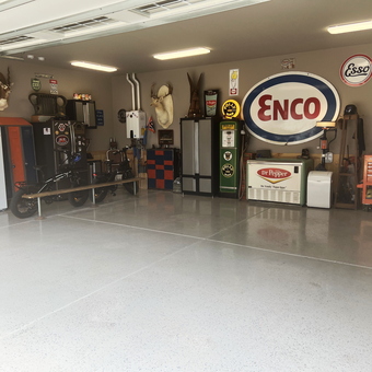 Organized garage with vintage signs and tool storage - Brett from Helena, AL