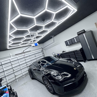 Modern garage with hexagon LED lights and cabinets - John from Weston, FL
