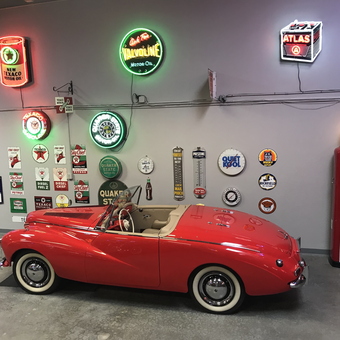 Classic Red Convertible and Vintage Garage Signs Display - Dave