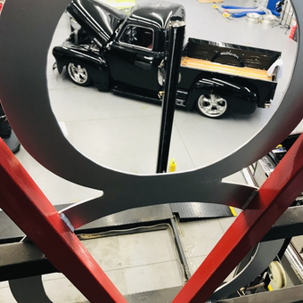 Classic Black Truck on Lift in Modern Garage - Dave