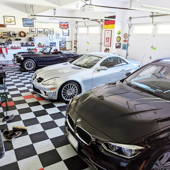 Classic and Modern Cars in Checkered Floor Garage - Rich