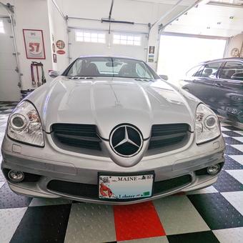 Checkered Garage Flooring and Wall Decor with Mercedes - Rich