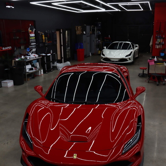 Modern garage with LED ceiling lights and Ferraris - Jamie from Westlake Village, CA