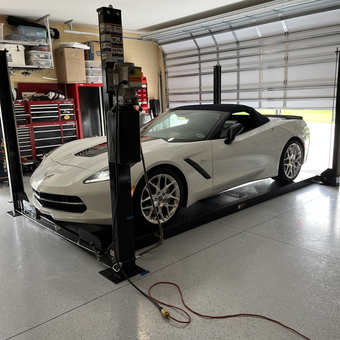 Four post car lift and tool storage in garage - Ron from Palm Coast, FL
