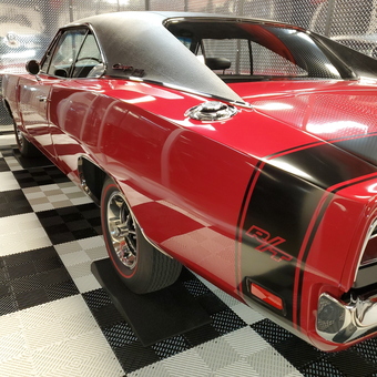 Classic car on checkered garage flooring with diamond plate walls - Julie from Forest Lake, MN