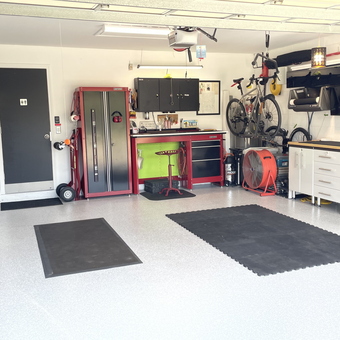 Organized Garage with Cabinets, Workbench, and Bike Storage - Glasco