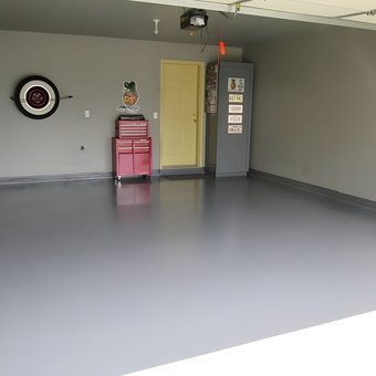 Organized garage with red tool chest and wall decor - Brad from NORTHFIELD, MN