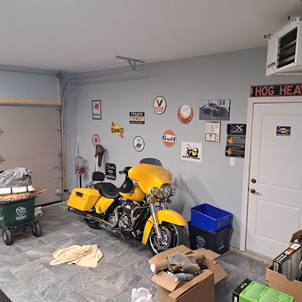 Motorcycle Garage with Wall Signs and Storage Bins - Anthony