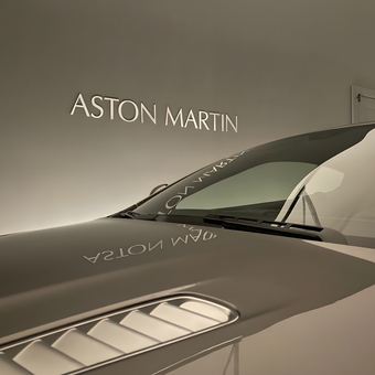 Aston Martin garage wall sign and luxury car - Charles from Kalamazoo, MI