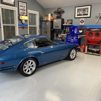 Organized garage with blue classic car and tool storage - Jay from Taylors, SC