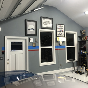 Organized garage with wall art, cabinets, and tool storage - Jay from Taylors, SC
