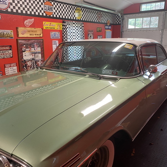 Classic Car in Retro Garage with Vintage Signs - ci-28146