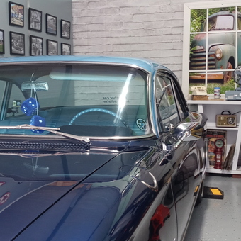 Classic Car Garage with Wall Art and Tools - Rudy