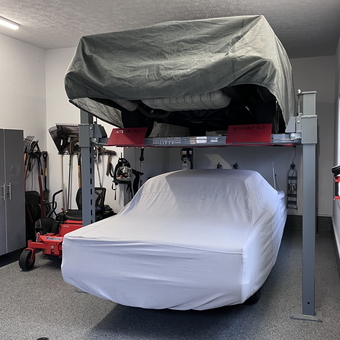 Two Covered Cars on Lift with Storage Cabinets - Bob from North RouLton, OH