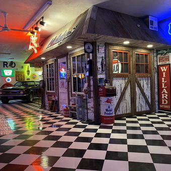 Retro Garage Decor with Classic Signs and Gas Pumps - Mark from Shiocton, WI
