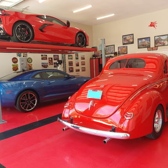 Custom Garage with Lift, Classic Cars, Red Flooring - Harm from FL