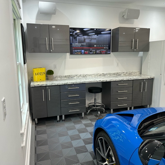 Modern garage with gray cabinets, workbench, and fridge - Tom from LA, CA