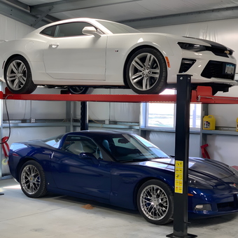 Four post car lift with two sports cars - Carlin Copenhaver from Treynor, IA