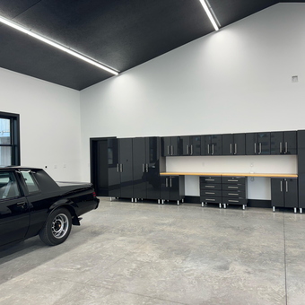 Modern Garage with Black Cabinets and Classic Car - Art