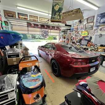 Chevy Camaro, tools, and wall decor in garage - Anthony kirkland from Wake, VA