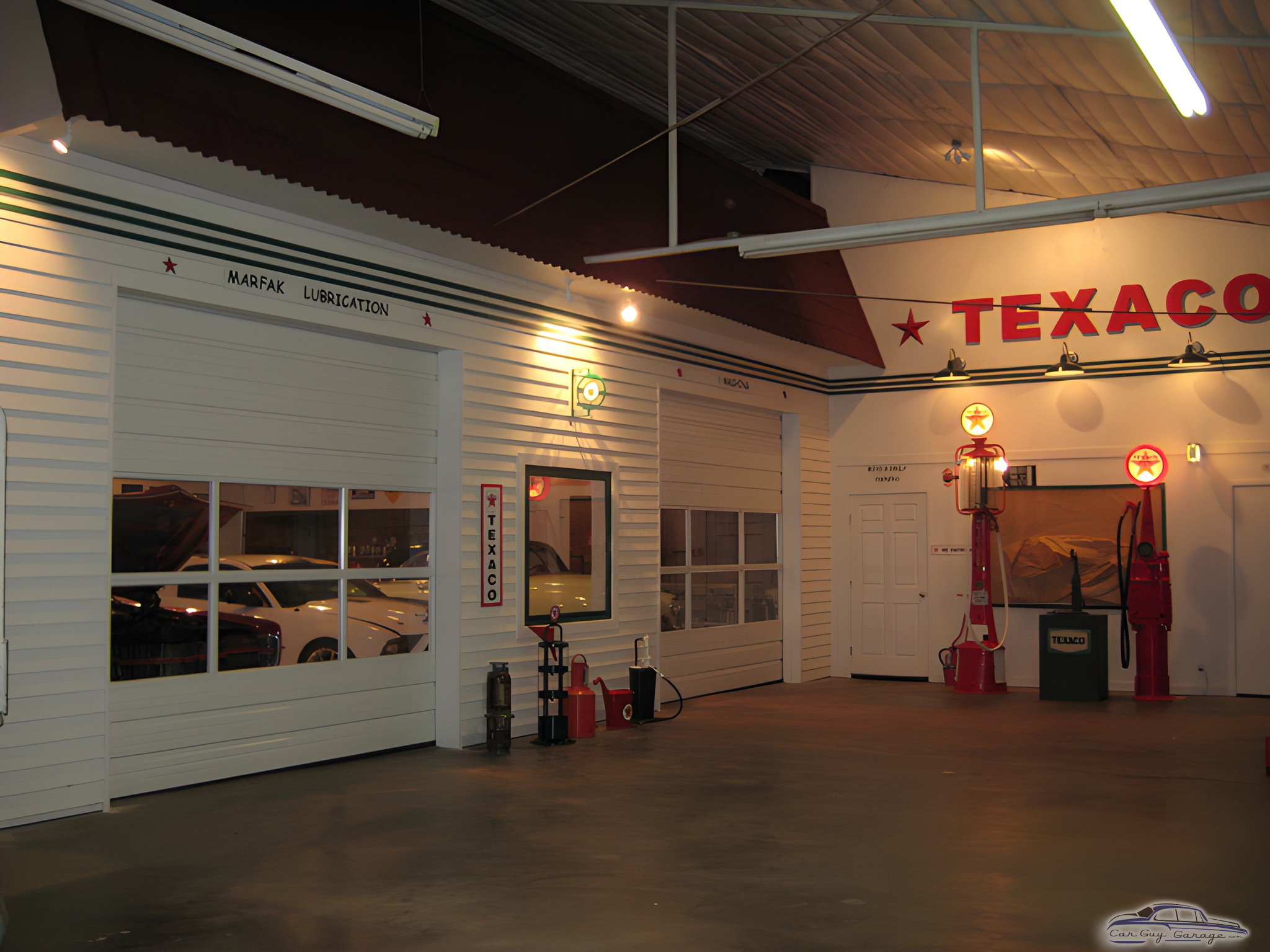 Vintage Texaco Garage Decor with Gas Pumps and Signs - Boyd from Rosharon, TX