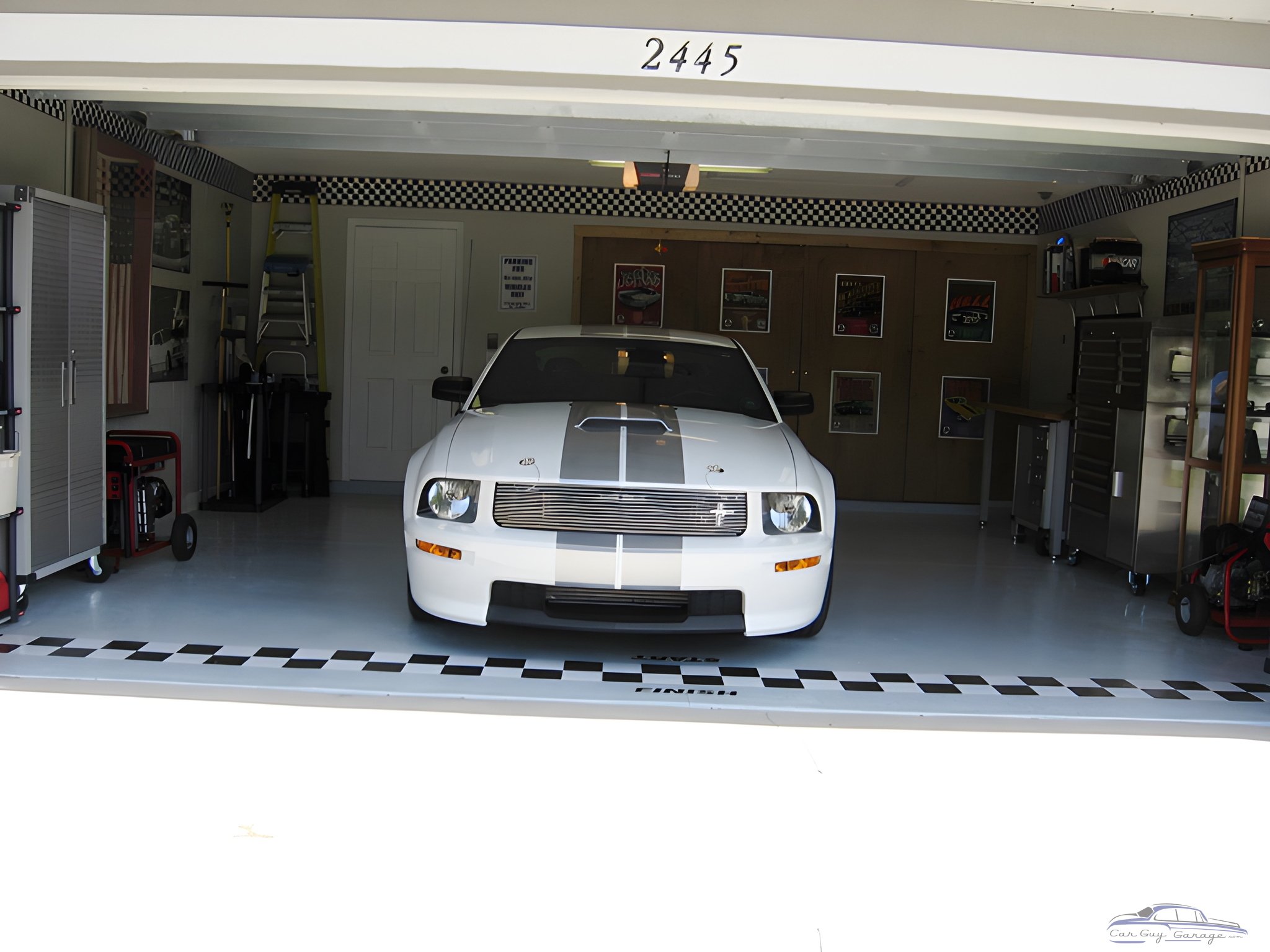Organized garage with white Mustang and storage cabinets - Loy from Kissimmee, FL