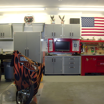 Organized garage with cabinets, workbench, and motorcycle - Jeremy from Clarksville, TN