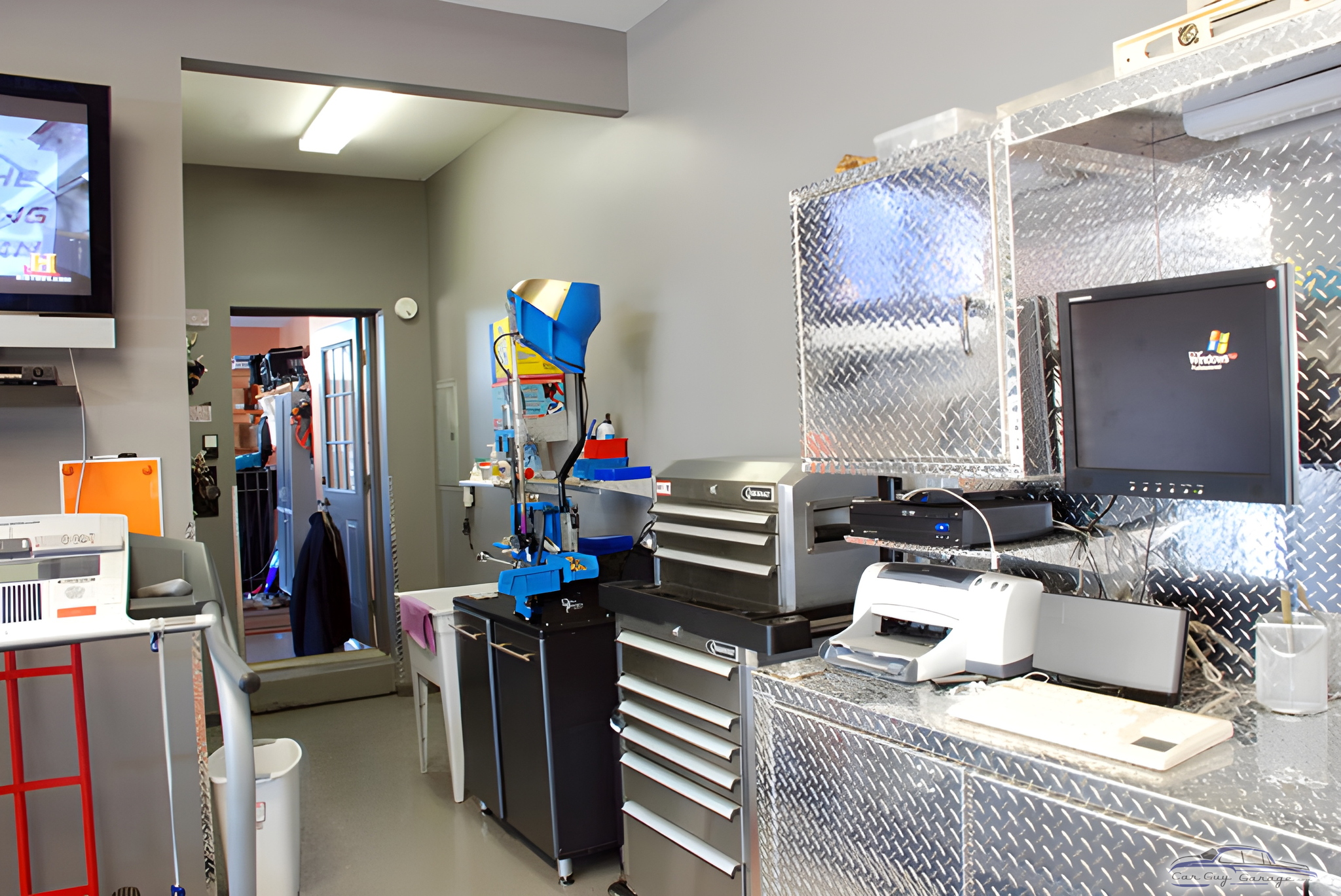 Diamond Plate Cabinets and Tool Chests in Modern Garage - Tom from Louisville, KY