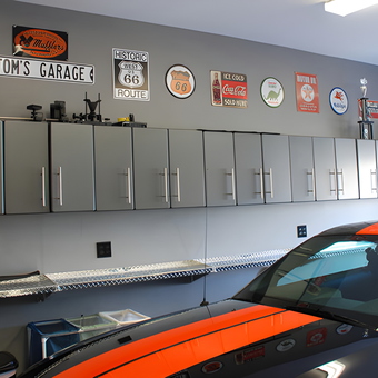 Modern garage with metal cabinets and wall signs - Tom from Louisville, KY