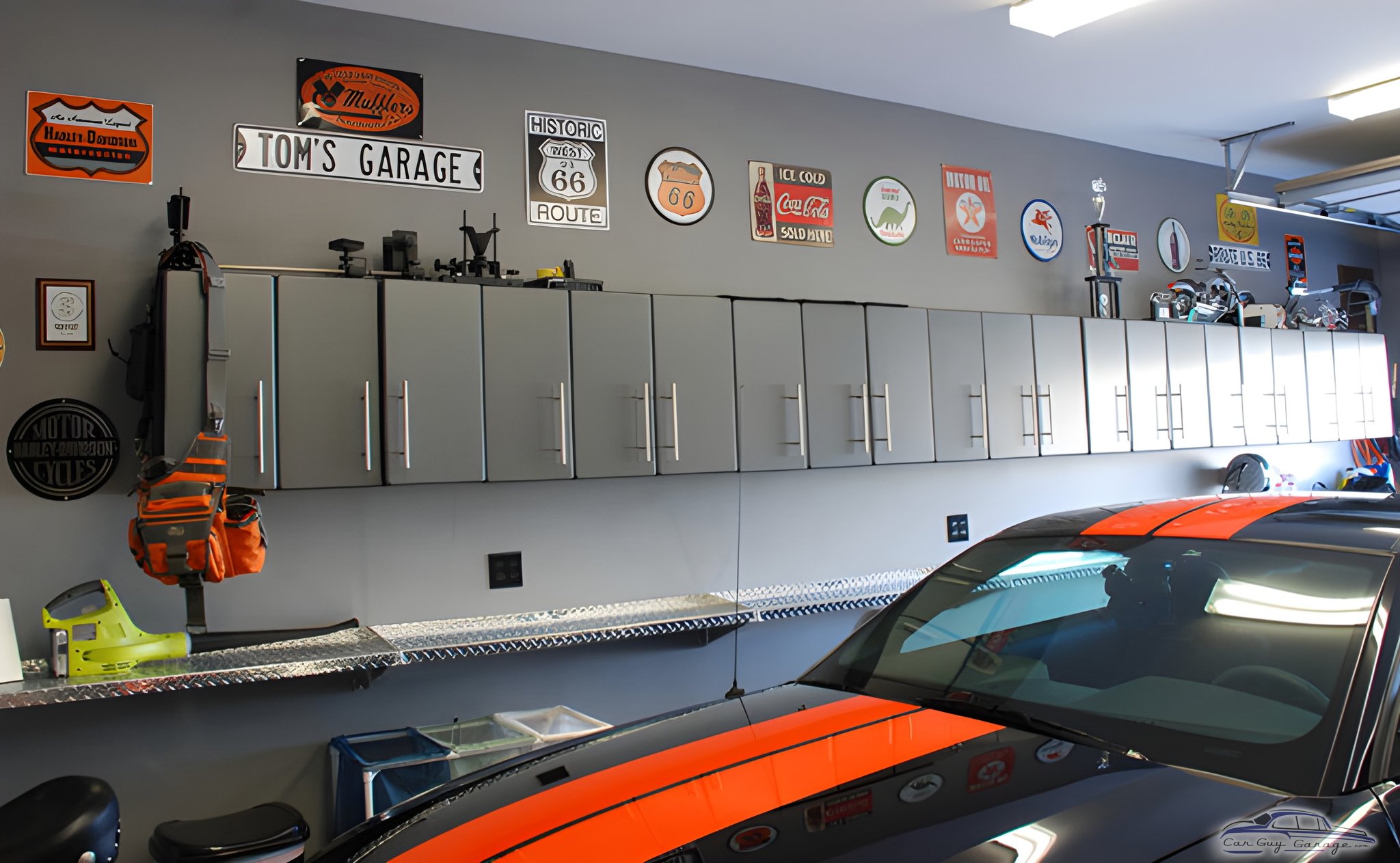 Modern garage with metal cabinets and wall signs - Tom from Louisville, KY