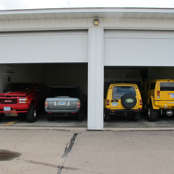 Spacious garage with four SUVs parked inside - Dan from Maple Grove, MN