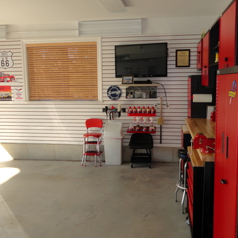 Organized Garage With Red Cabinets and Wall Storage - Bill from Oyster Bay, NY