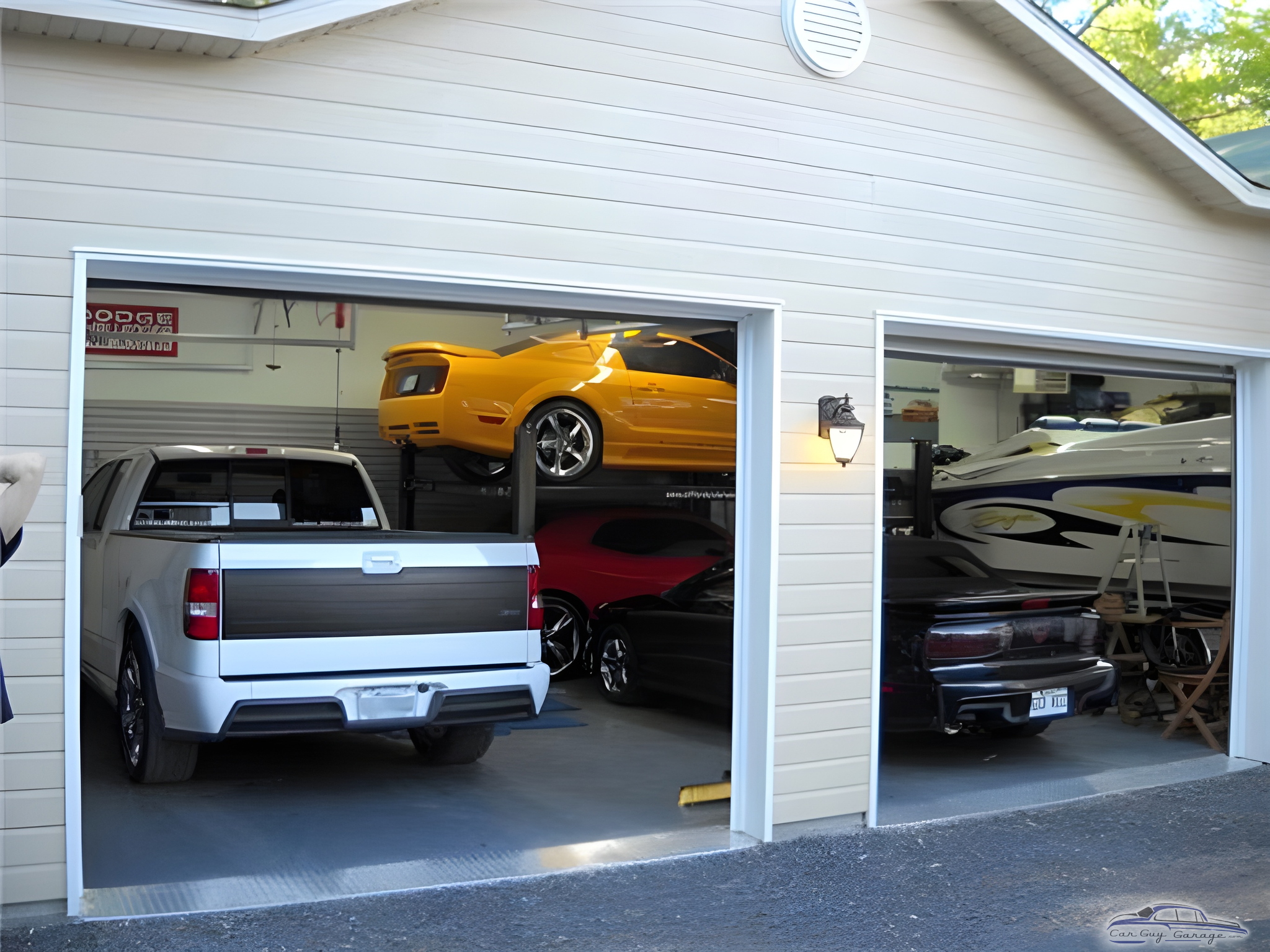 Spacious garage with car lifts and vehicles - Daniel from Quebec, Canada