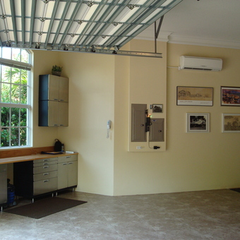 Modern garage with metal cabinets and workbench - Len from Sewalls Point, FL