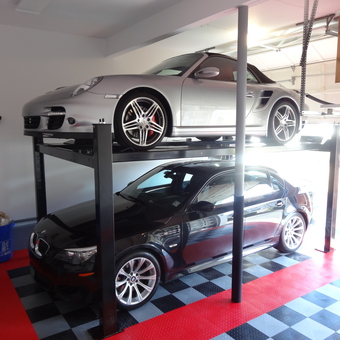 Garage Car Lift with Luxury Cars and Tile Flooring - Philip Alfano from Monroe Township, NJ