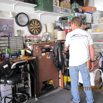 Organized garage workspace with tool storage and dartboard - Ben from Aliso Viejo, CA